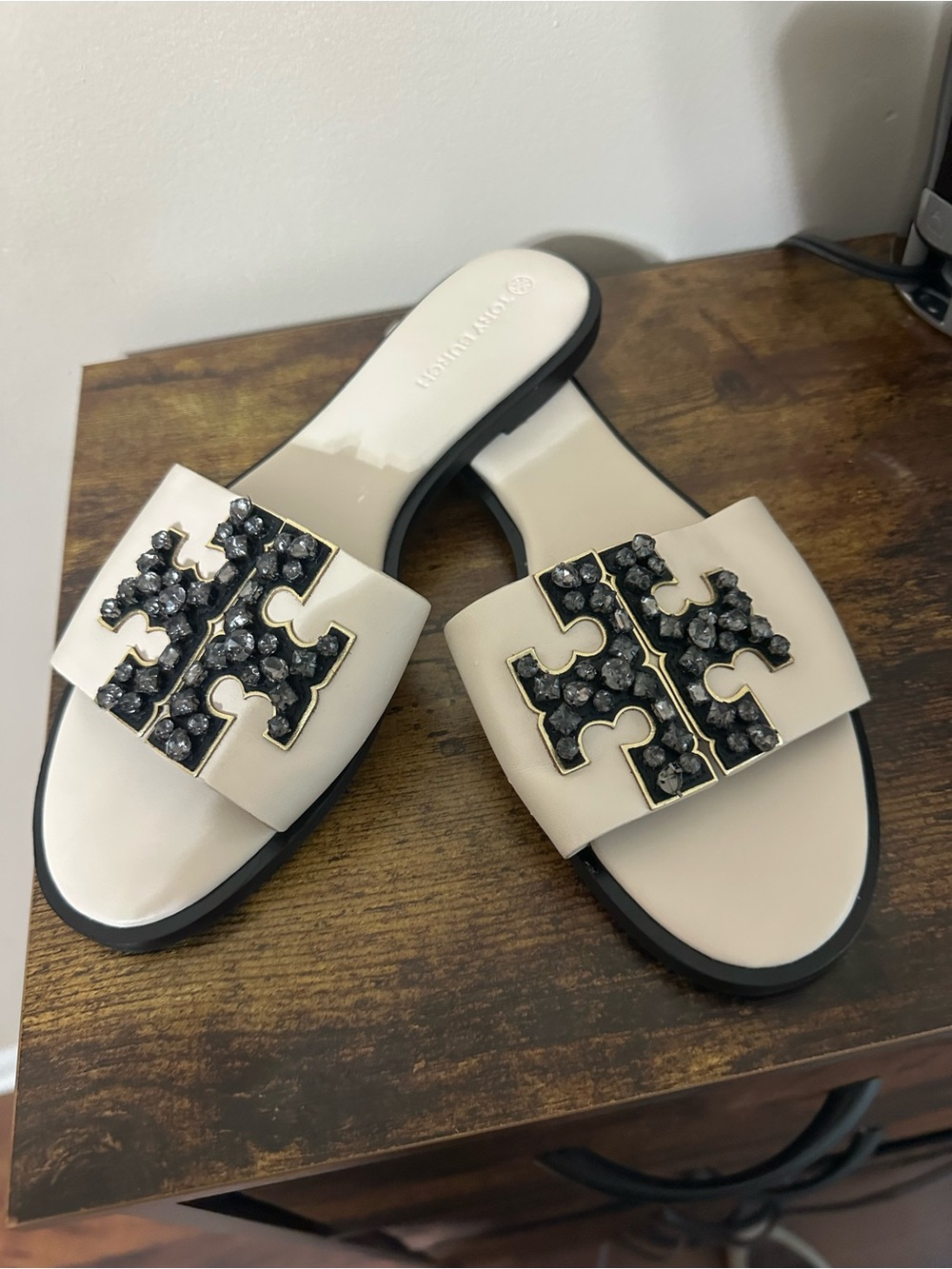 Tory Burch Ivory Slide Sandals with Black Crystal Logo